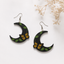 Black crescent moon wooden earrings with butterfly and leaf design for women