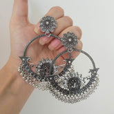 Dancing Couple Big Chaand Baaliyan Stone Studded Silver Oxidised Earrings