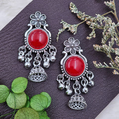 Traditional Oxidised Silver Jhumka Earrings With Red Stone And Bell Drops.