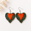Angel wing heart wooden earrings with orange heart and teal gold feather wings
