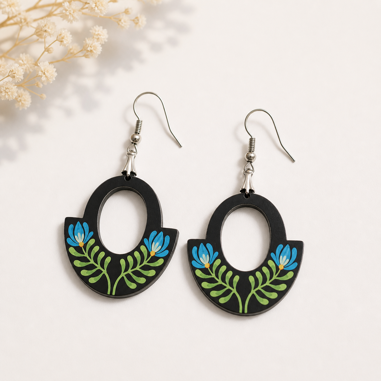 Black wooden earrings with blue floral design for women Main image