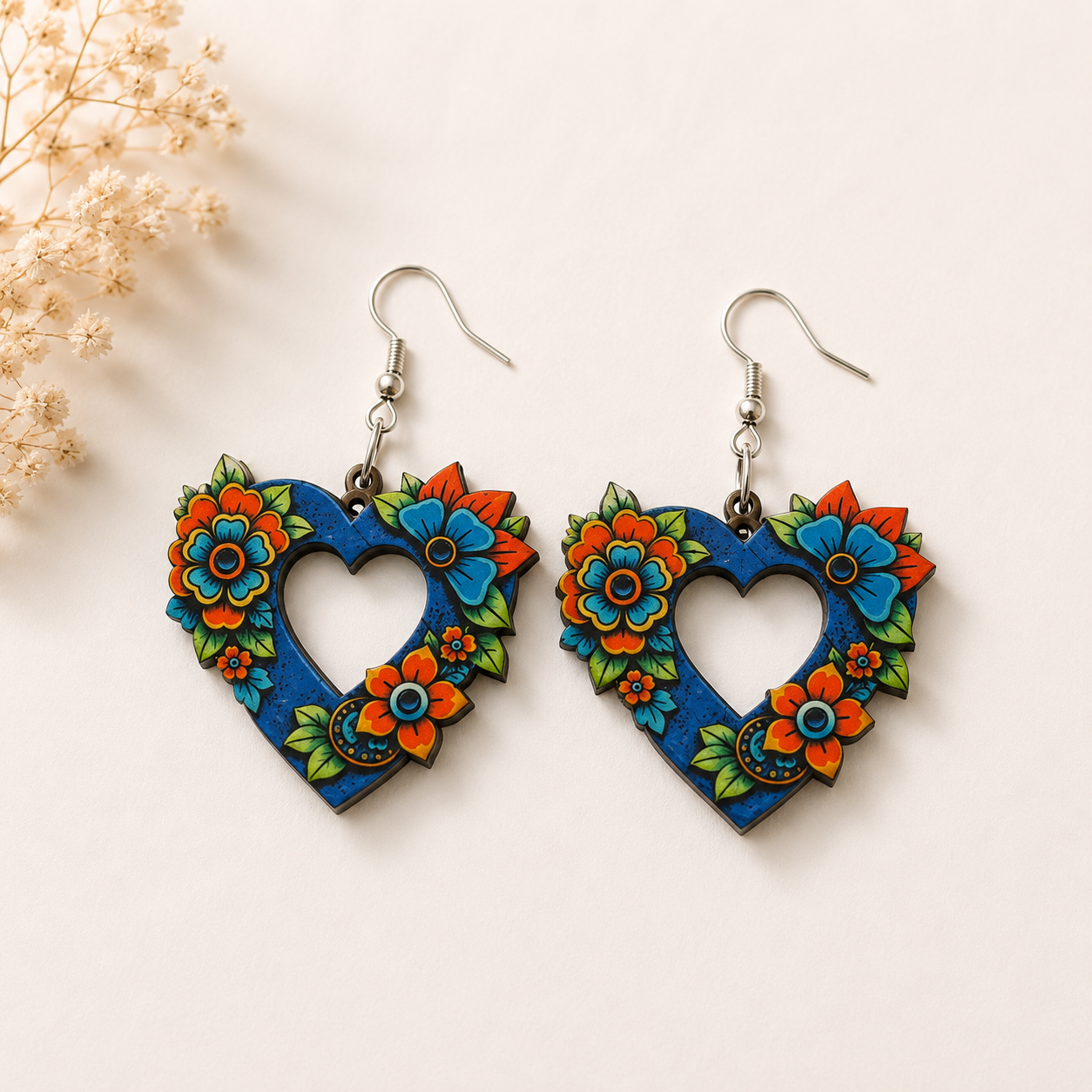Blooming Heart wooden earrings for women featuring a blue heart with colorful floral artwork and lightweight fish hook ear wires. Main image