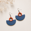 Blue and orange geometric wooden earrings for women with sunburst fan design