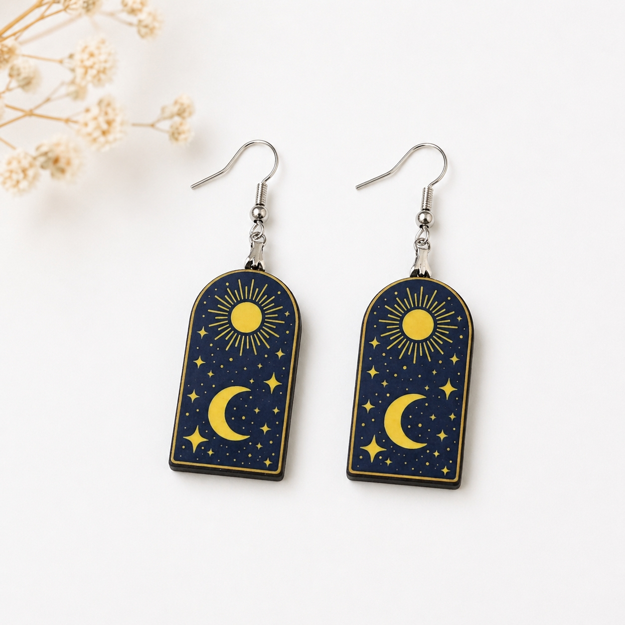 Celestial sun and moon wooden earrings with stars navy blue background spiritual cosmic jewelry for women Main image