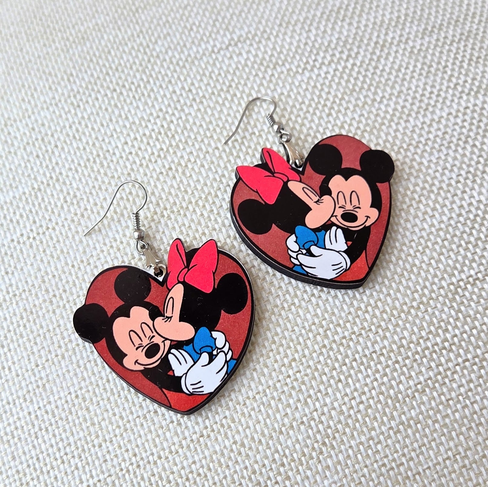Disney Mickey Mouse and Minnie Mouse heart-shaped wooden earrings for women featuring a romantic kissing design with lightweight fish hook ear wires. Main image