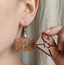 Envelope shaped wooden earrings for women with heart cutout romantic love letter design lightweight statement jewelry.