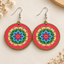 Floral mandala round wooden earrings for women – colourful boho dangler with pink border and blue-green flower pattern