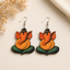 Ganesha lotus wooden earrings for women with orange and green spiritual Indian design