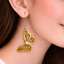Golden butterfly wooden drop earrings with delicate wing cutwork design