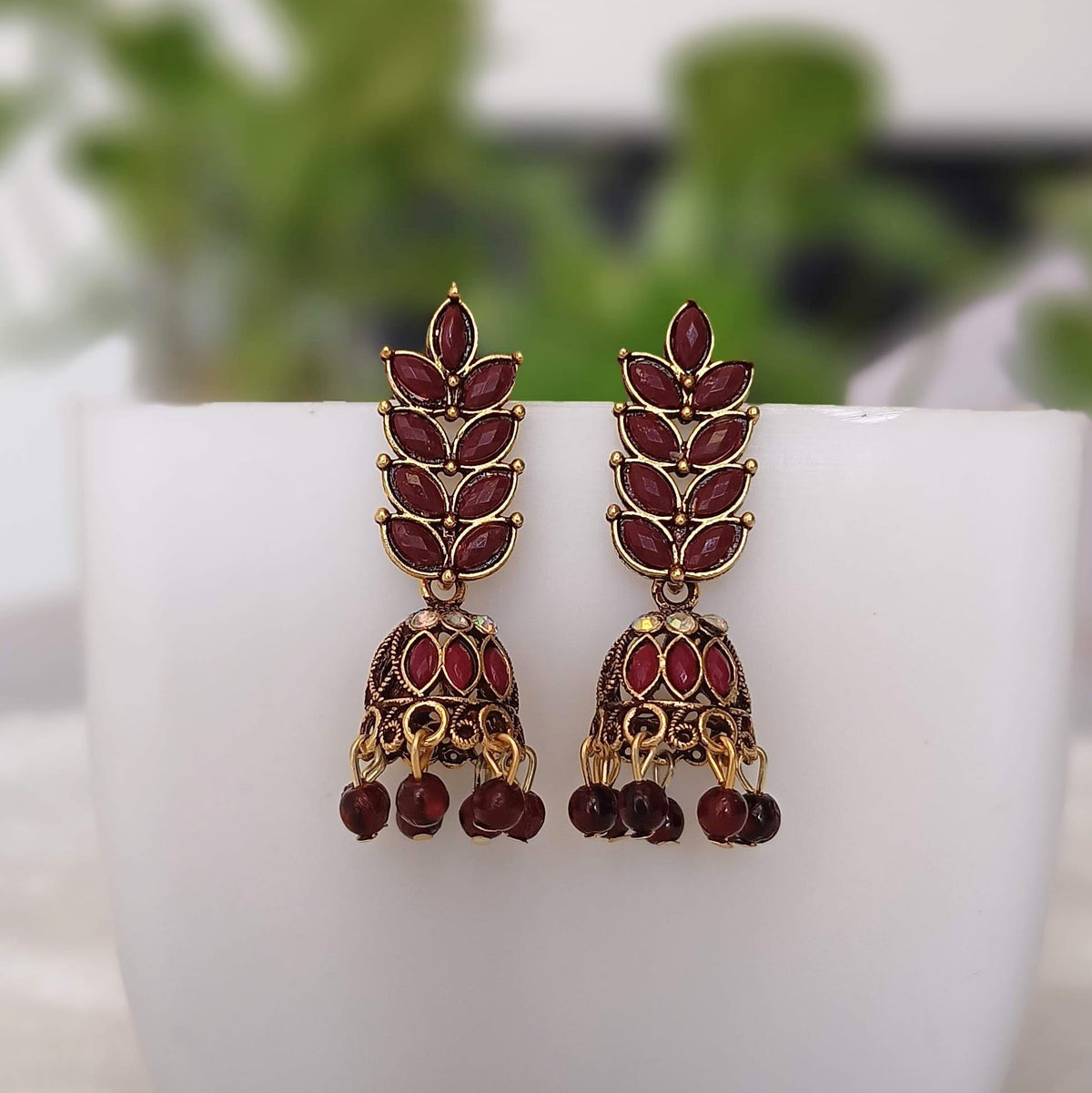 Dark Red Color Stone Leafs Jhumka Golden Oxidised Earrings