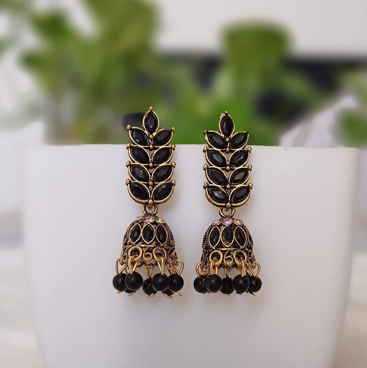 Black Color Stone Leafs Jhumka Golden Oxidised Earrings