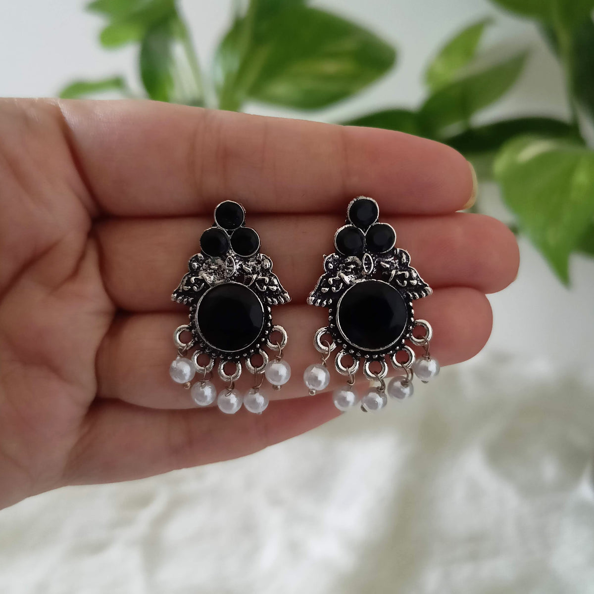 Round Shape Gorgeous Black Stone Studded Silver Oxidised Earrings
