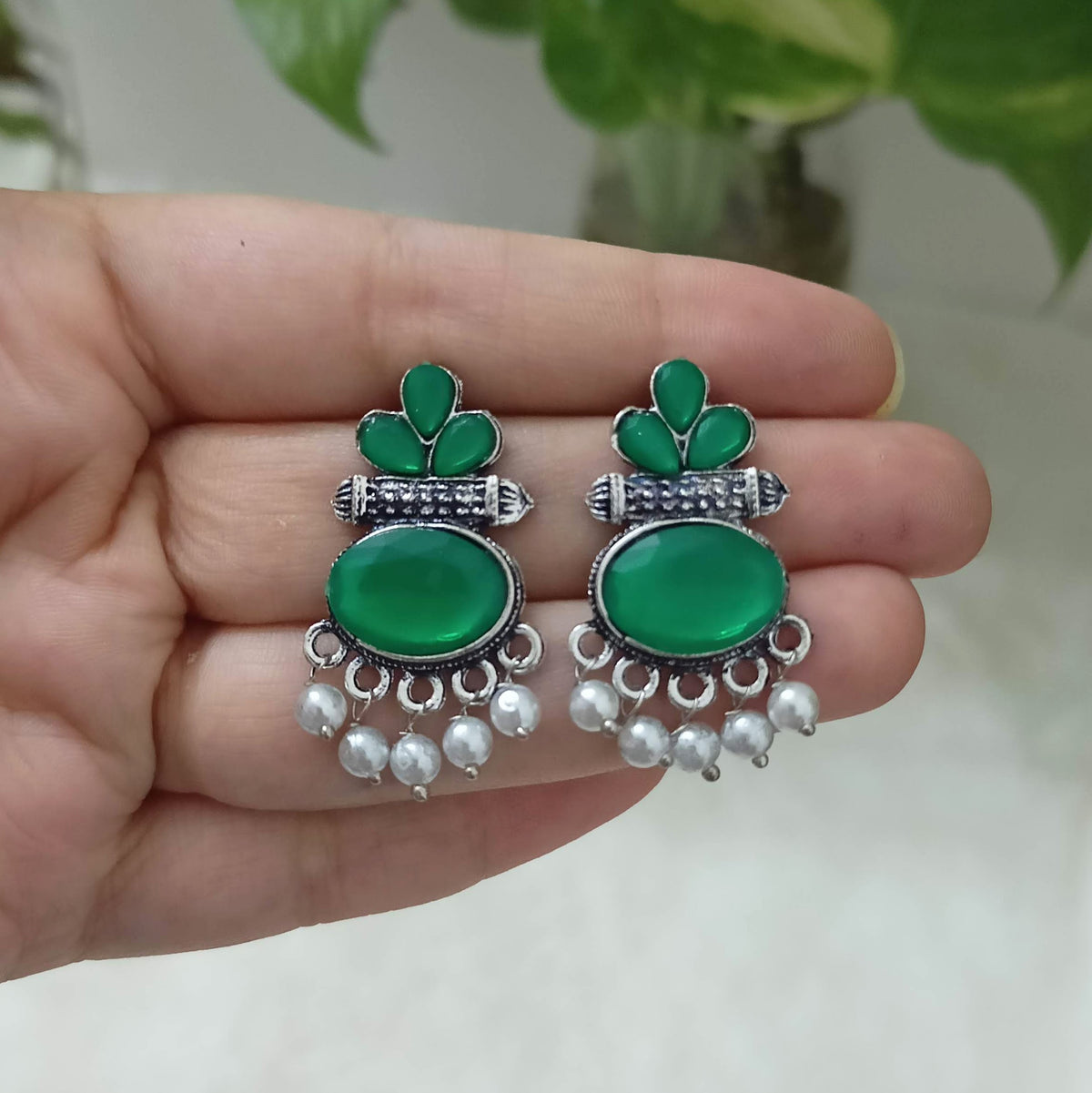 Green Color Stone Studded Oval Shape Silver Oxidised Earrings