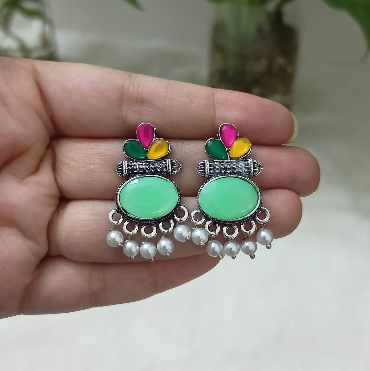 Light Green & Multicolor Stone Studded Oval Shape Silver Oxidised Earrings
