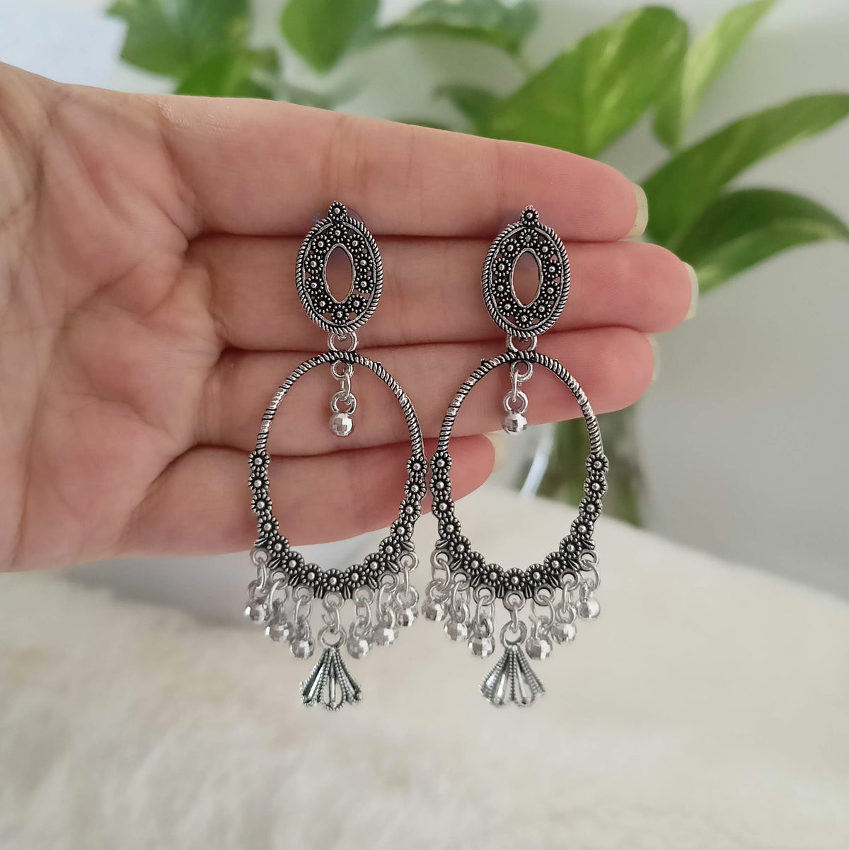 Flower Design Oval Shape Jhumka Silver Oxidised Earrings