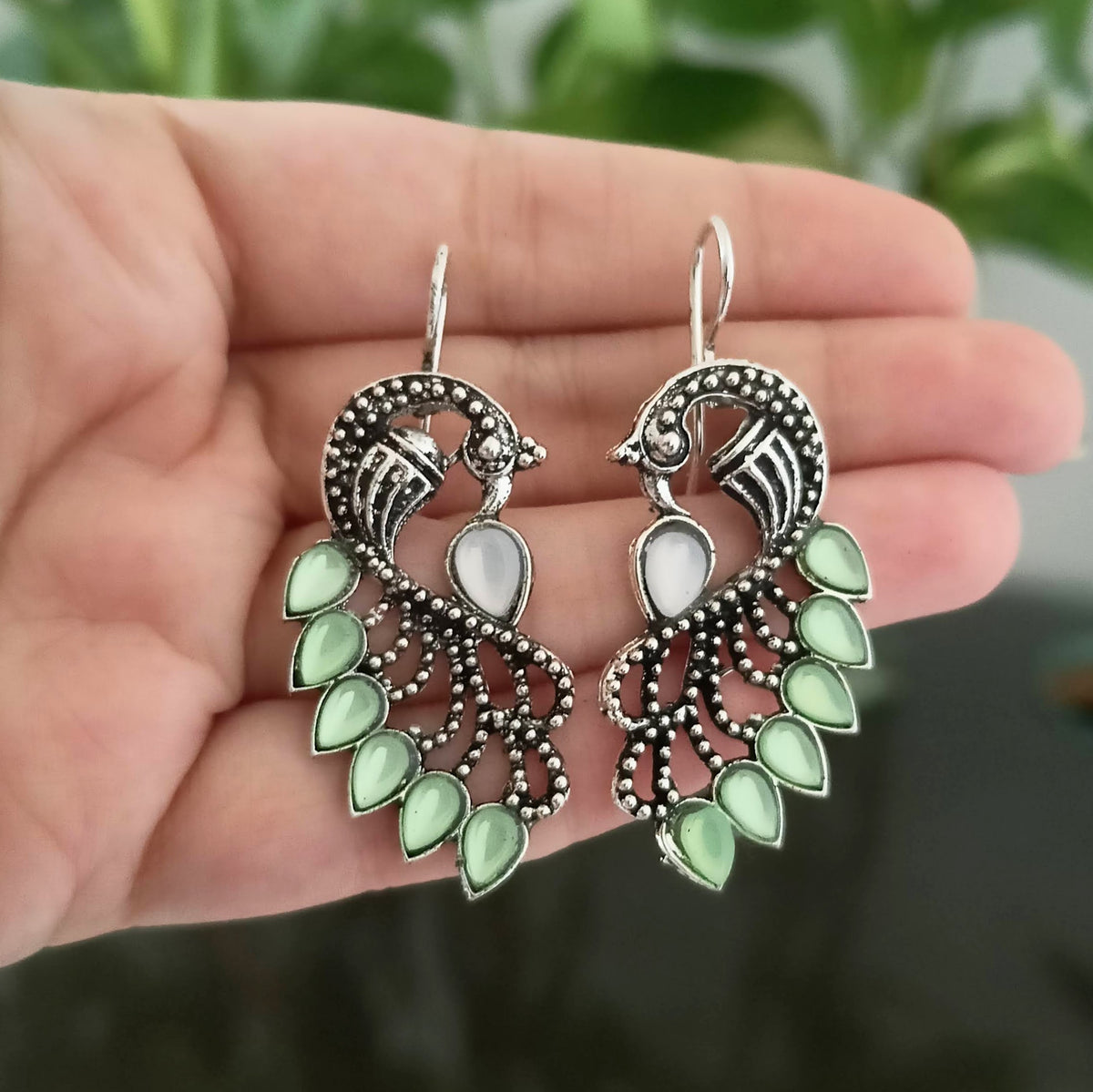 Green Color Peacock Stone Studded Feather Oxidised Silver Earrings
