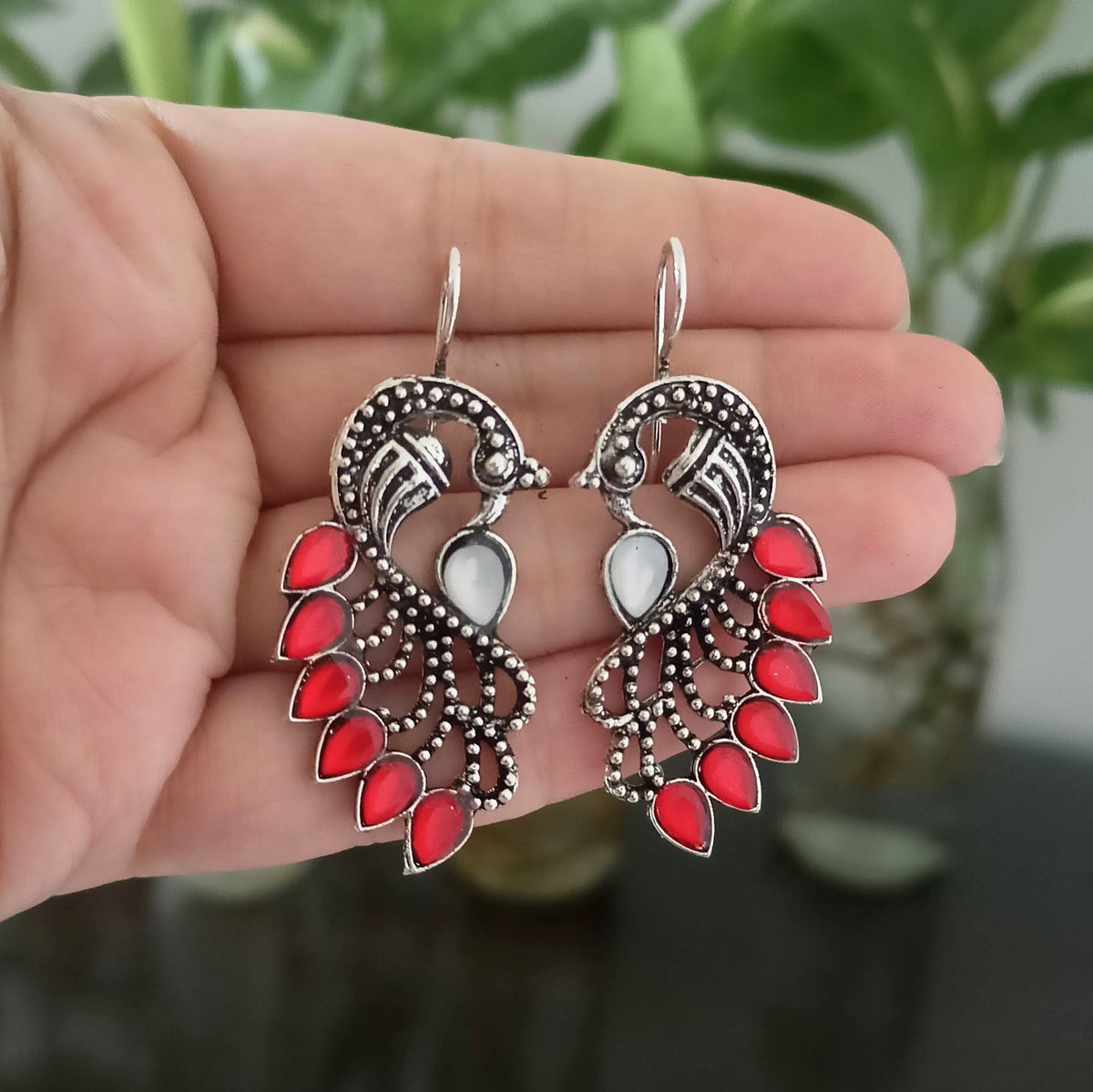 Red Color Peacock Stone Studded Feather Oxidised Silver Earrings