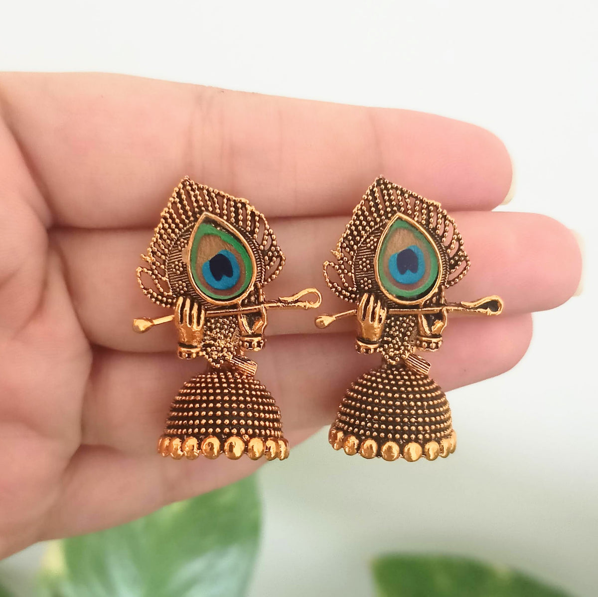 Peacock Sticker With Bansuri Jhumka Oxidised Golden Earrings