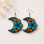 Moon Bloom Wooden Earrings for Women featuring crescent moon floral design with blue and orange flowers and lightweight silver hooks