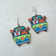 Scooby-Doo Mystery Machine wooden earrings for women featuring Scooby-Doo, Shaggy, Fred, Daphne, and Velma in a colorful cartoon van design with fish hook ear wires.