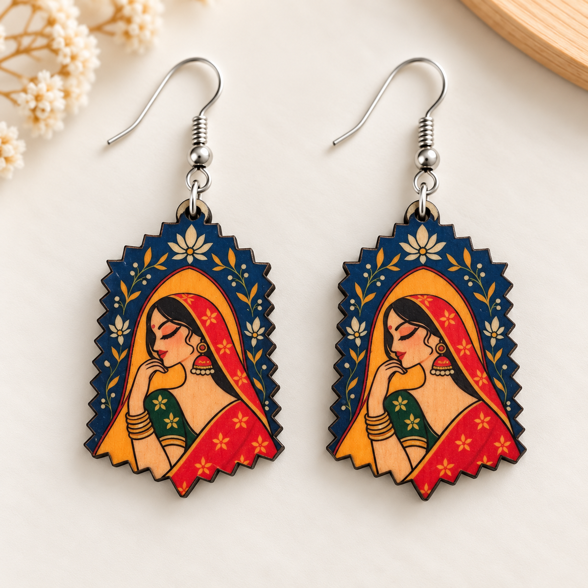 Traditional Indian lady wooden earrings for women – arch dangler with woman in red saree and navy lotus border Main image