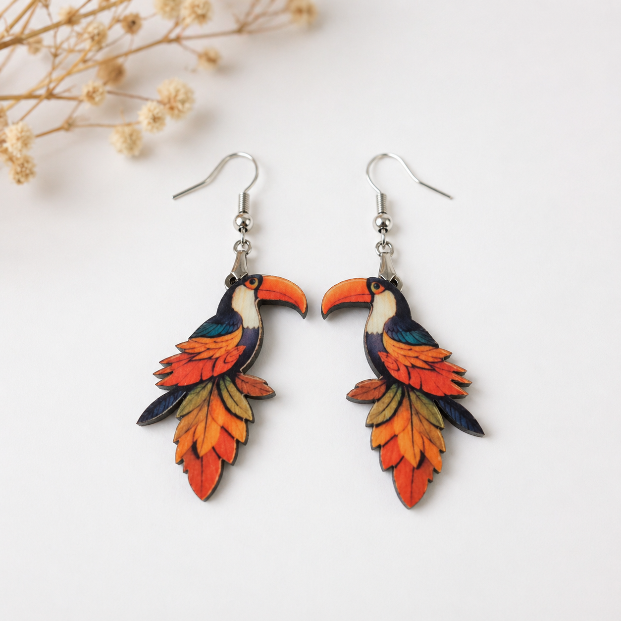 Tropical toucan wooden earrings with colorful feathers nature inspired artistic statement jewelry for women Main image